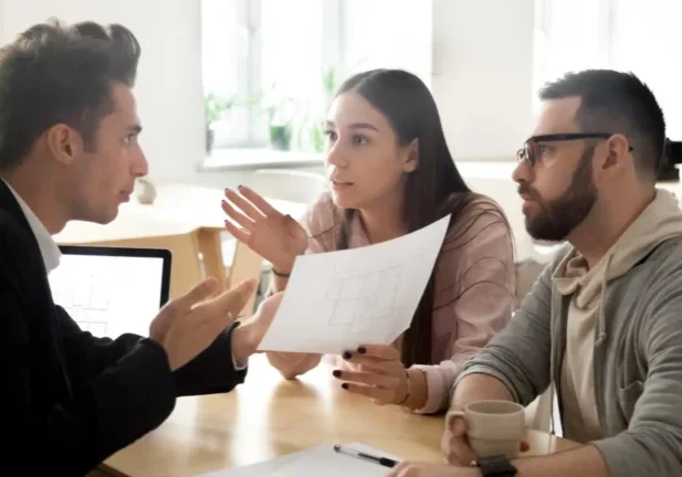 Lighting disputes - A couple arguing with someone at a desk